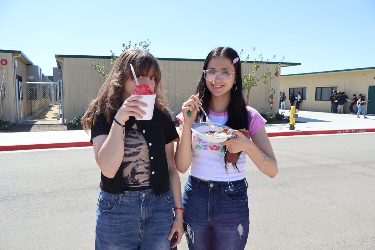 Students, Cristal Magana and Bianca Giannandrea, enjoying their food