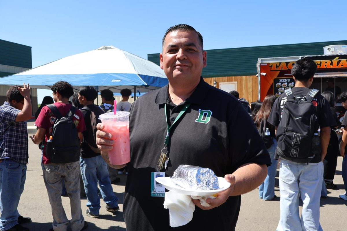 Mr. Fernandez showing off his food