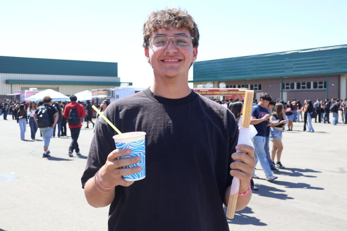 Student, Logan Bledsoe, enjoying his food
