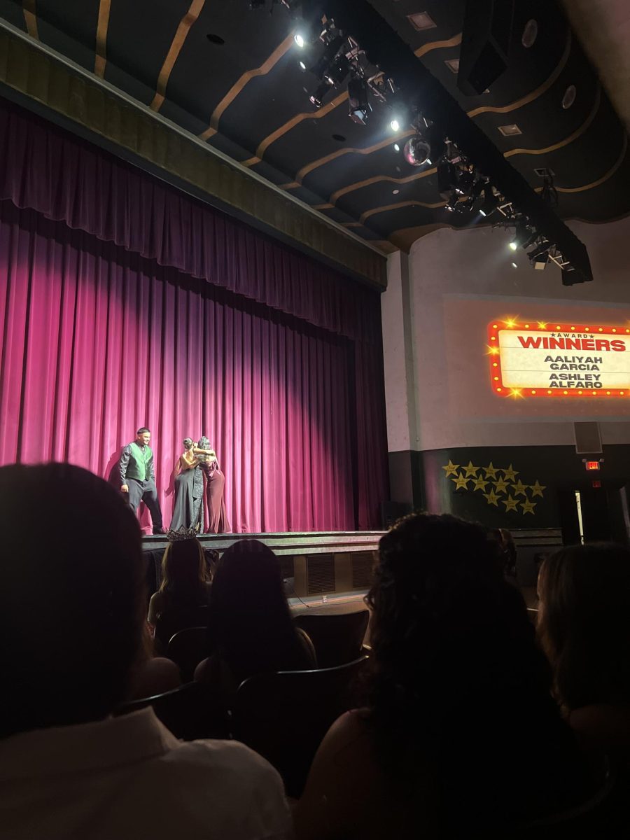 Best friends, Aaliyah Garcia and Ashley Alfaro hugging as they accept Dynamic Duo award