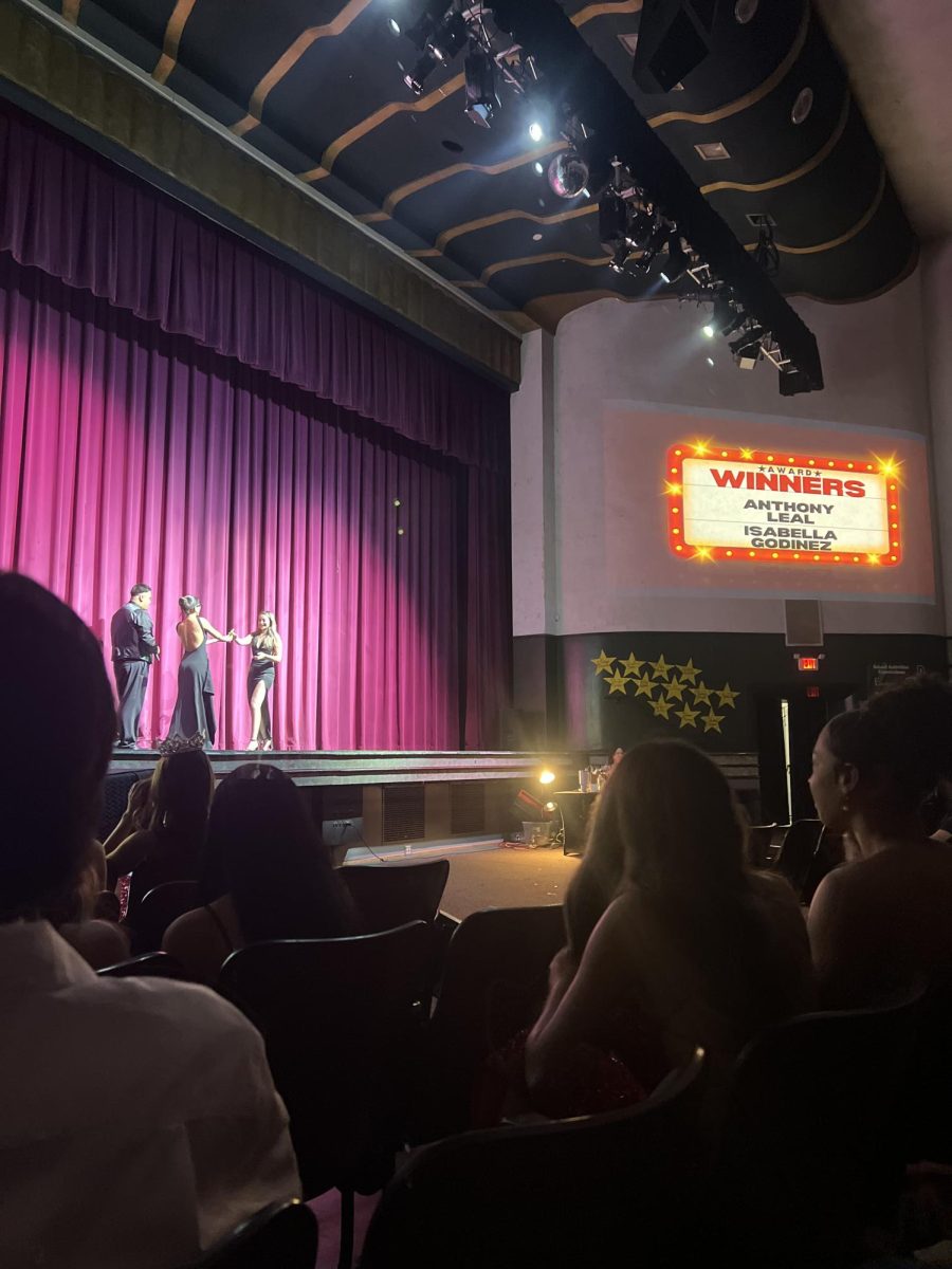 Isabella Godinez accepting Best Eyes award